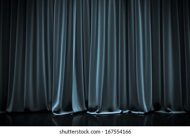 blue closed curtain in a theater