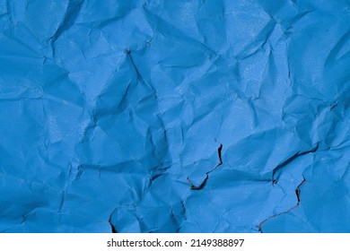 Blue Creased Sheet Of Paper.