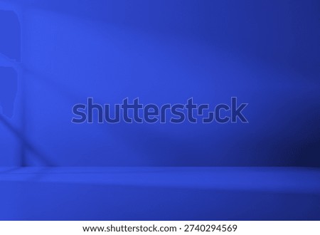 Blue Empty Studio Room with Subtle Shadow Play for Product Display