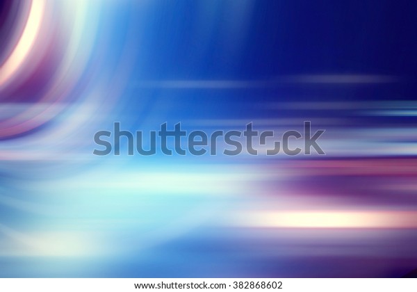 Blue gradient lines\
blurred in motion