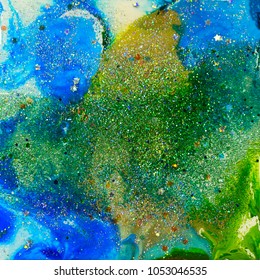 Blue And Green Abstract Composition With Alcohol Inks And Fine And Chunky Glitter In Epoxy.