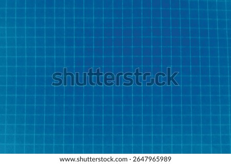 Blue grid paper texture background. Perfect for engineering, drafting, educational projects, or digital mockups with a technical or scientific theme.