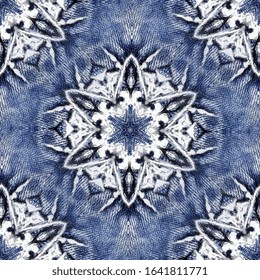 Blue Jeans Destroyed And Torn With A Seamless Patchwork Pattern.
Denim Fabric For Youth Best For Background And Fashion Wallpaper. Repeating Hand-embroidered Flower Motif. Grunge Or Hippie Style.