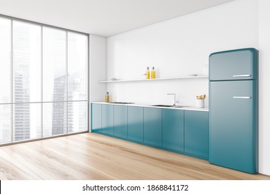 Blue Kitchen Set With Sink And Appliances, Wooden Floor And White Wall, Side View, Near Window. Minimalist Design Of Kitchen With Fridge And Stove, 3D Rendering No People