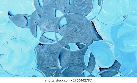 Blue leafy abstract pattern with translucent forms and soft flowing circular texture.