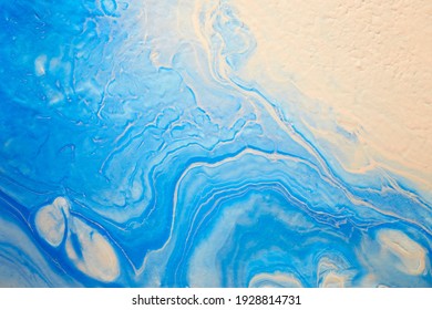 Blue and pink colors abstract hand painted fluid art texture. Close-up creative background for your design