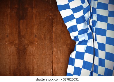 Blue And White Flag Against Weathered Oak Floor Boards Background