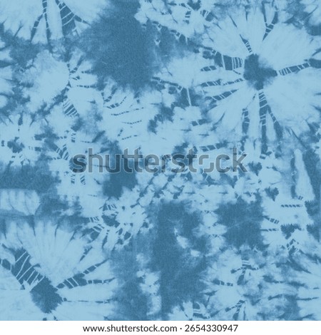 A blue and white tie dye pattern creates an abstract and artistic background