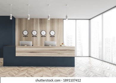 Blue And Wooden Reception Room With Desk, Computers And Clocks On Wooden Wall. Minimalist Reception Desk On Parquet Floor In Business Office Near Window, 3D Rendering No People