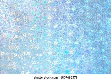 Blurred Blue Trendy Backdrop With Stars. Bright Holographic Foil Background. Colorful Background. Flat Lay