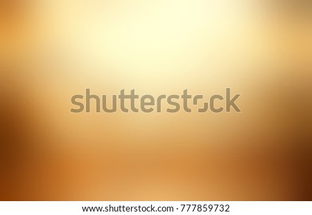 Blurred gold texture. Empty old metal background. Defocused gleam illustration. Yellow beige brown glare backdrop.