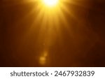 blurred image. shiny sun, sunbeams, sunrays, sunshine design. Yellow orange warm light effect, sun rays, golden beams isolated on black background. star dust