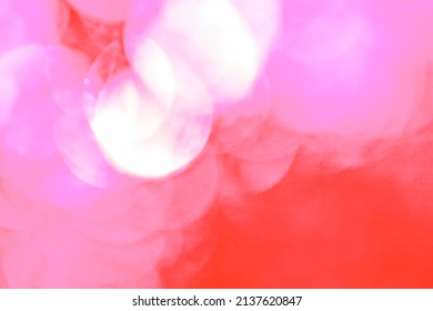 Blurred lights on a pink and red background