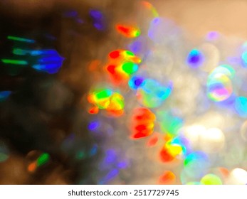 Blurred rainbow light
refraction Background.