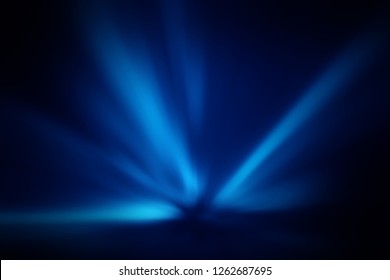 Blurred Rays Of Light Abstract Blue Background