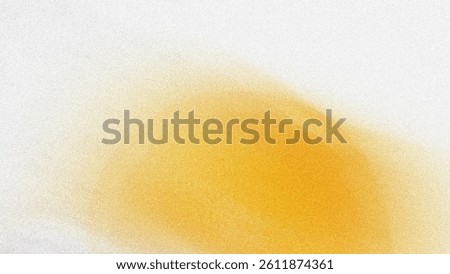 A blurry abstract image featuring a blend of yellow orange and white creating a soft and dreamy aesthetic look