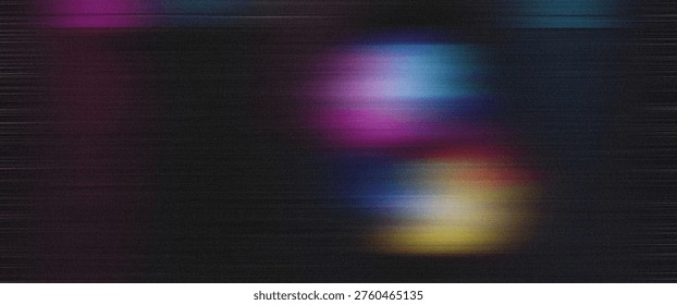 A blurry abstract image featuring glowing multicolored spots on a dark textured background, creating a sense of softness and subtlety.