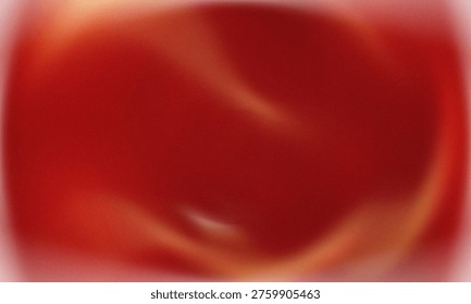 A blurry image of a red object