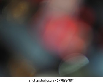 bokeh from reflection of flash light on a hannd bag