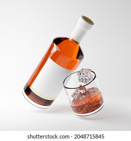 Bottle With Blank Label And Glass Of Scotch Whiskey With Ice Isolated Over White Background. Mockup Template. 3d Rendering.