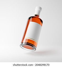 Bottle Of Scotch Whiskey With Blank Label Isolated Over White Background. Mockup Template. 3d Rendering.