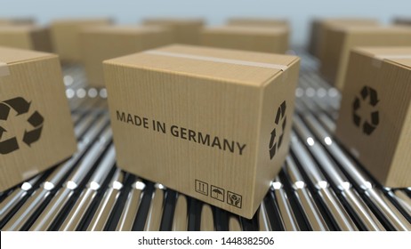 Boxes with MADE IN GERMANY text on roller conveyor. German goods related 3D rendering