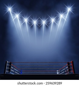 Boxing ring and floodlights , Fight night event