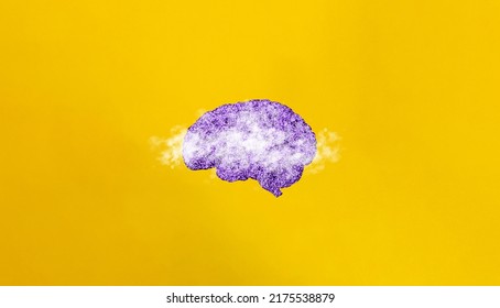 Brain Fog, Mood Swings And Mental Fatigue Concept And Banner. Brain And Clouds On Yellow Background. Minimal Aesthetics.