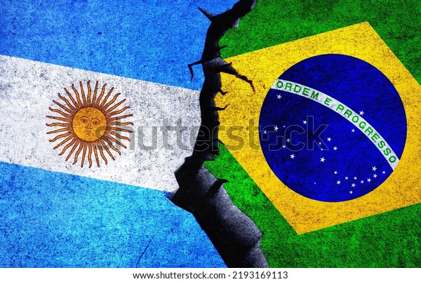 Brazil vs Argentina concept flags on a wall with\
a crack. Argentina and Brazil political conflict, war crisis,\
economy relationship, trade\
concept