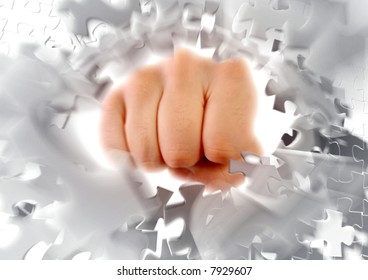 Breaking puzzle by knocking it to pieces. Photo-based graphic compositing.