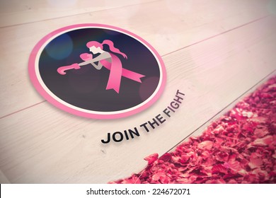 Breast cancer awareness message against autumn leaves against white wood - Powered by Shutterstock