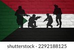 Brick wall painted with Flag of Sudan with silhouette of soldiers. Symbols depicting the Civil War. The civil war between Sudanese government forces and the paramilitary "Rapid Support Forces". 