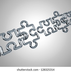 Bridge The Gap Business Cooperation Concept With A Group Of Three Dimensional Metal Linked Chain Network In The Shape Of Puzzle Pieces Connecting Together To Form A Strong Financial Team.