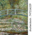 Bridge over a Pond of Water Lilies, by Claude Monet, 1899, French impressionist oil painting. In the summer of 1899 Monet completed 12 canvases of the wooden footbridge over the lily pond at Giverny