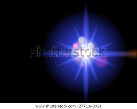 A bright light burst effect with multiple radiant beams emanating in a star-like pattern. The central glow is white, transitioning to blue as it extends outward. Smaller, circular light reflections in red, purple, and pink add visual interest. The background is black, enhancing the illumination and contrast of the light burst. No specific location or elements suggest a particular setting.
