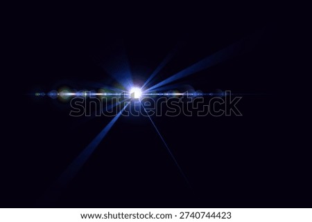 A bright light in the darkness with rays emanating from it