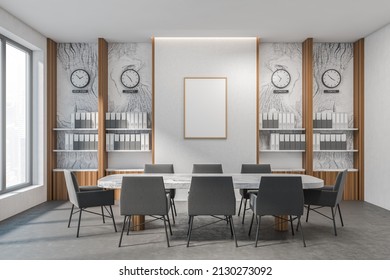 Bright office conference room interior with meeting board, desk, window, Marble walls, concrete floor. Time zone clocks. White framed poster template. Concept of international coworking. 3d rendering