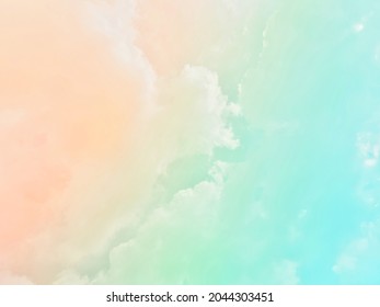 Bright pastel rainbow gradations green  pink   gently orange   There is subtle blend the atmospheric background the beautiful natural sky and softly faded white clouds 