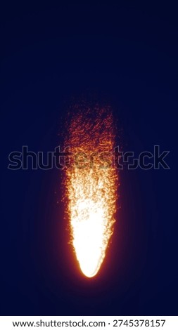 A bright stream of falling fire particles glowing against a dark background, forming a dynamic fiery trail.