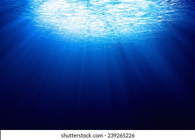 Bright Sunlight Shining Through Clear Blue Sea Water