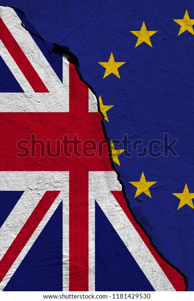 British and European Union flag separated by a crack on\
a wall. 