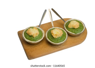 Broccoli Souffle On Wooden Plate. Isolated On White Background