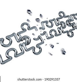 Broken chain puzzle business concept as metal links shaped as jigsaw puzzle pieces shattered breaking apart as an icon of freedom success or partnership failure on a white background.