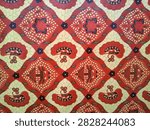 a brown bckground with a beaitiful batik pattern typical of javanese, Indonesia. 