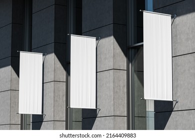 Building Exterior With Three Blank Roll Up Posters Mounted Outdoor, Grey Tile Wall. Mockup Copy Space, 3D Rendering