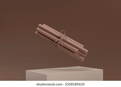 A bundle of brown sticks with a string tied to them. The sticks are arranged in a way that they look like they are floating in the air. Concept of lightness and playfulness