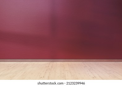 Burgundy Red Textured Wall And Light Wooden Floor In Empty Room For Displaying Your Product, Light Coming Through Window. 3D Illustration.