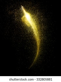 Burst Of Gold Powder Isolated On Black