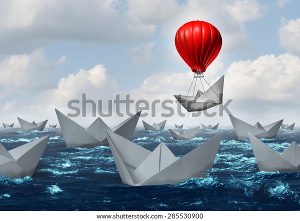 Business advantage concept and game changer\
symbol as an ocean with a crowd of paper boats and one boat rises\
above the rest with a red balloon as a success and innovation\
metaphor for new\
thinking.