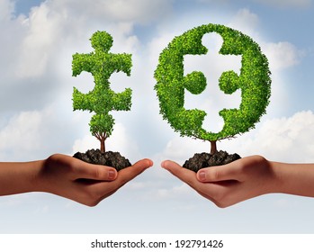 Business consulting advising and financial consulting concept with a hand offering a jigsaw puzzle piece tree to another hand with a missing part as a perfect fit metaphor for expert solutions.